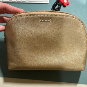 Pre owen Coach Cosmetic in case gold